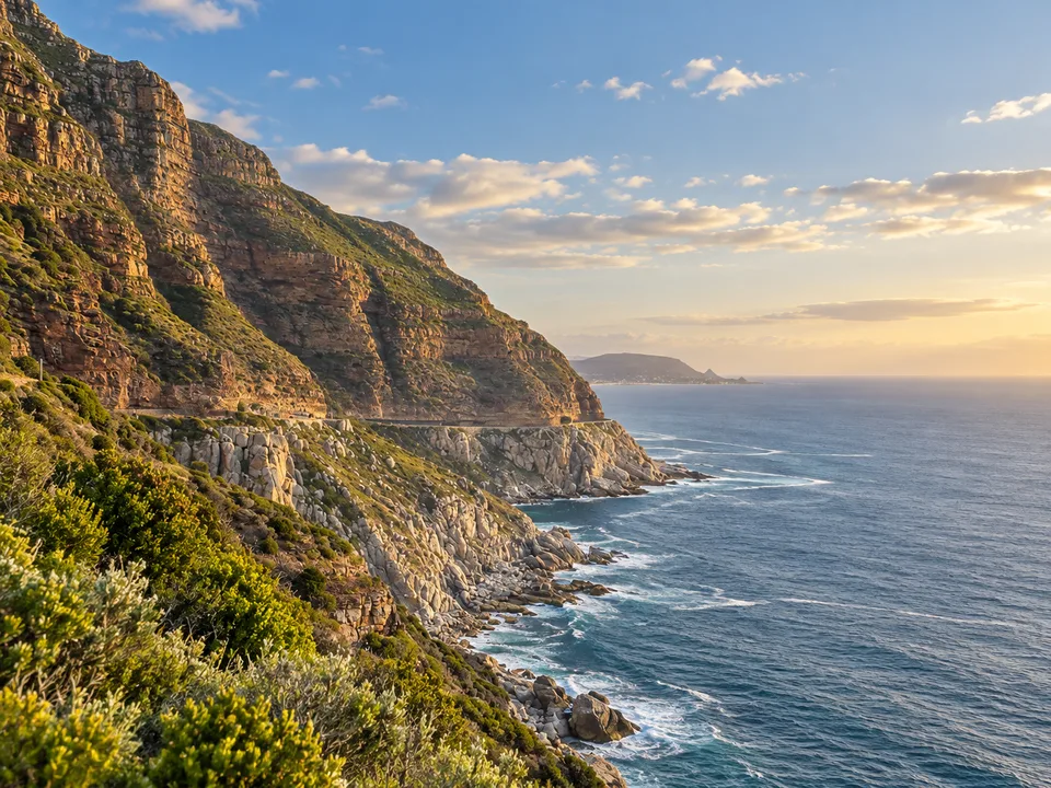 The coastal road beneath the cliffs of Chapmans Peak Drive